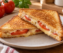 Tostados de tomate y queso al horno