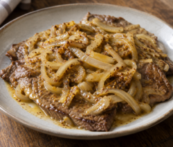 Bifes con cebolla y mostaza